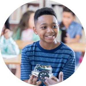 enthusiastic preteen holding mechanical car